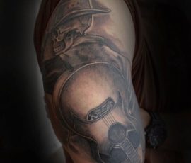 Portrait d'homme au chapeau en noir et gris sur le bras